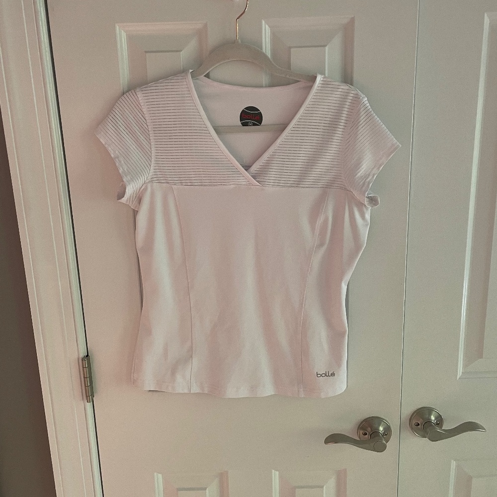 Bolle cute top with buttons down back.